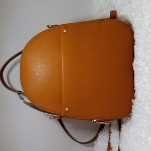 🆕 🆕 🆕 A new day backpack / crossbody purse in tan